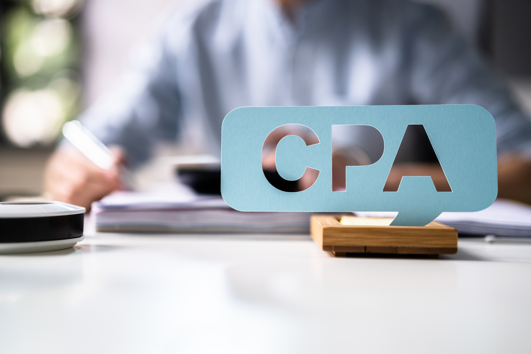 CPA Sign With The Businessman Analyzing The Invoice